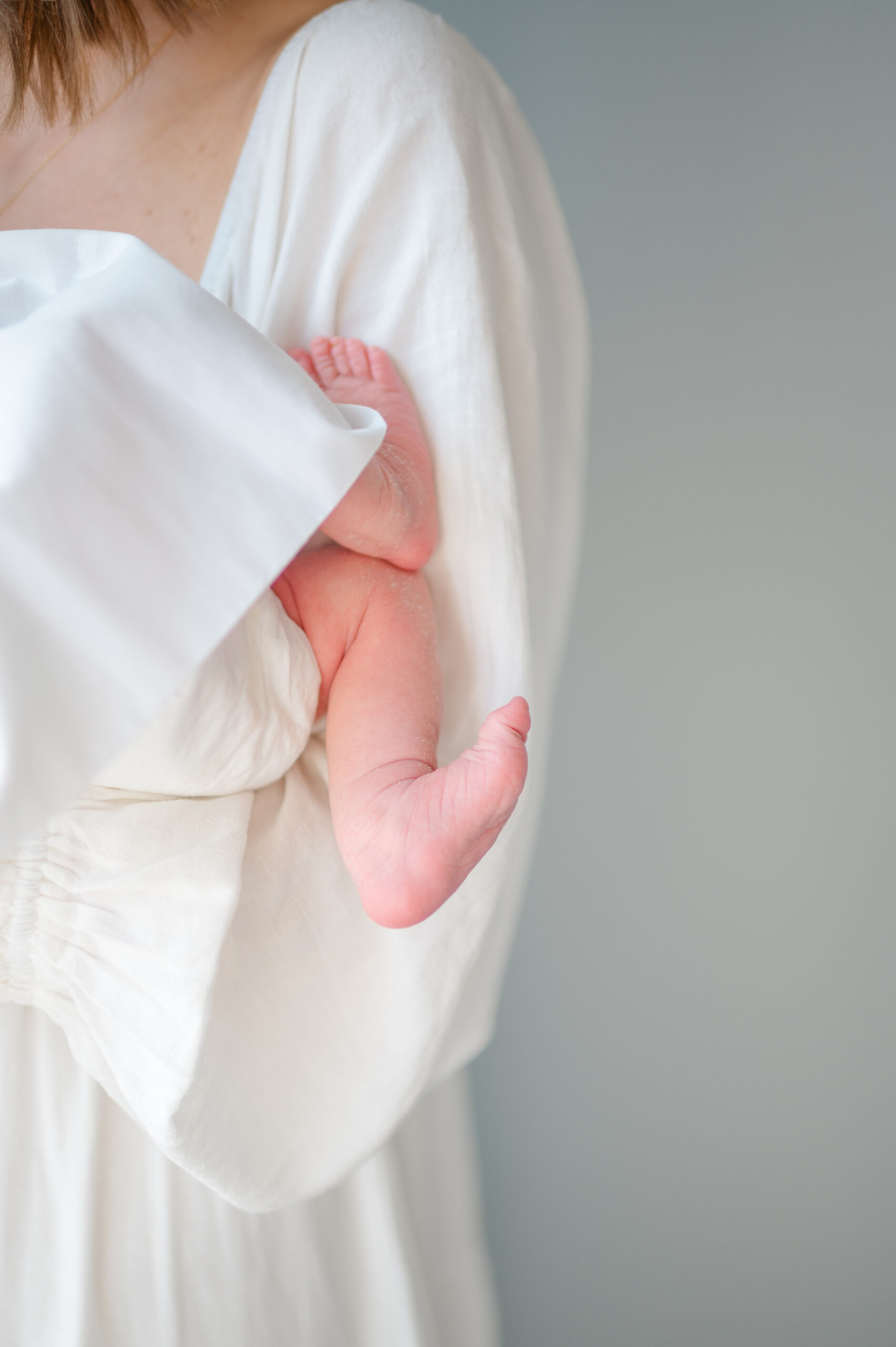 Postpartum prep: A mama holds a newborn baby